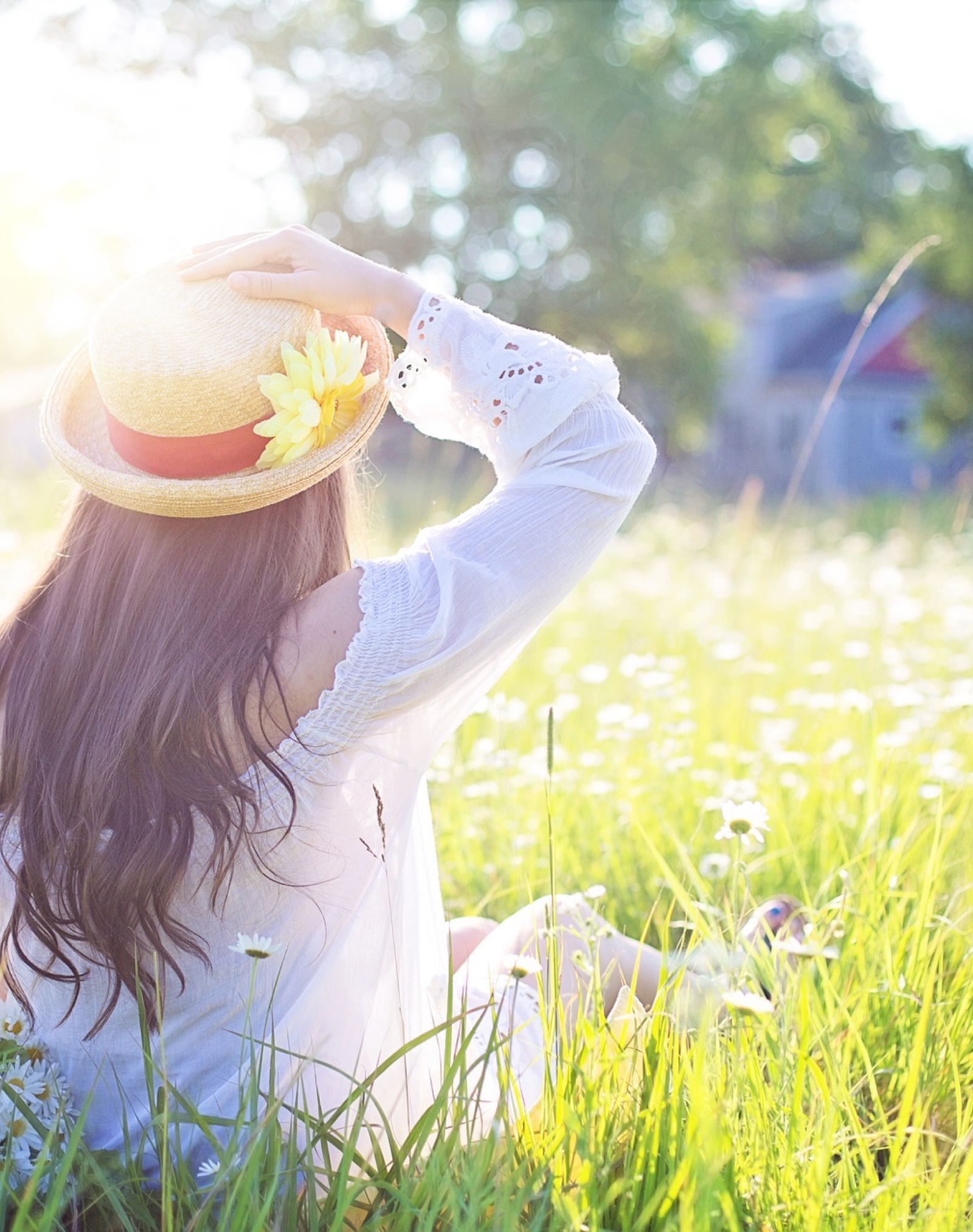 Person enjoying sunshine outside.